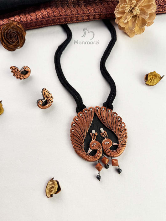 Roopkatha- Black & Copper Peacock Terracotta Jewellery Set | Manmarzi