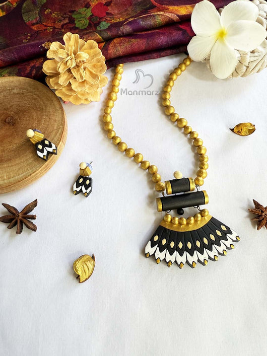 Prabha- Exquisite Golden & Black Terracotta Jewellery Set With White Detailing